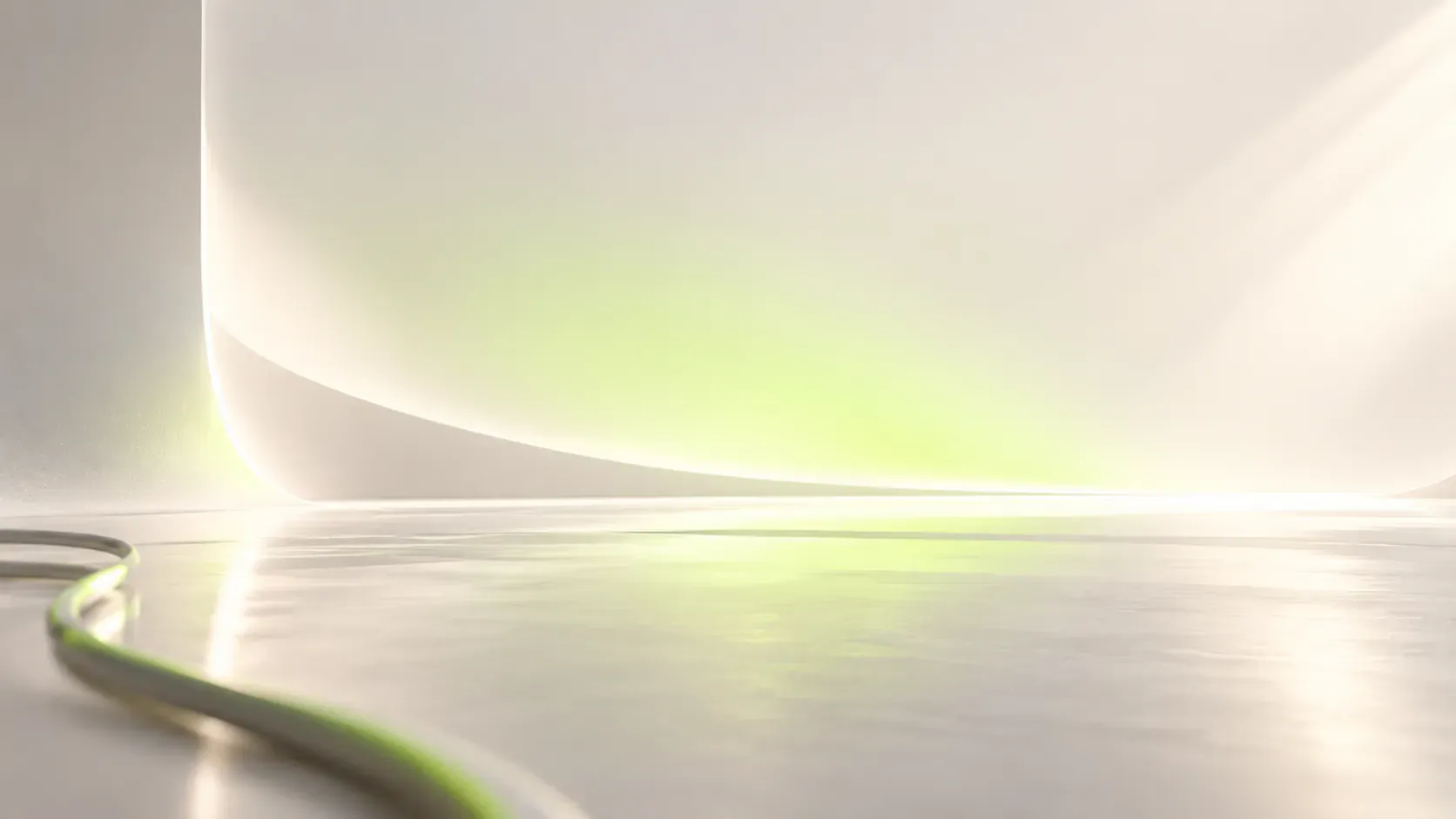 A soft white studio backdrop with a lime-green glow
